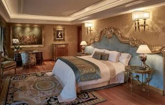 Elegant and comfortable king suite at the Rome Cavalieri, A Waldorf Astoria Hotel.