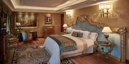 Elegant and comfortable king suite at the Rome Cavalieri, A Waldorf Astoria Hotel.