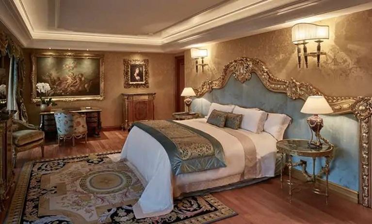 Elegant and comfortable king suite at the Rome Cavalieri, A Waldorf Astoria Hotel.