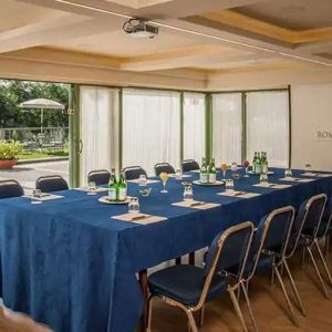 Meeting room overlooking the garden at the Rome Cavalieri, A Waldorf Astoria Hotel.