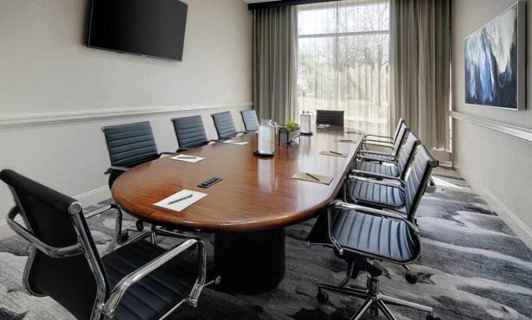 professional, bright-lit meeting room at Embassy Suites by Hilton Detroit Troy Auburn Hills.