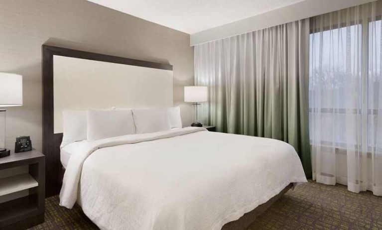 luxurious king bedrooom at Embassy Suites by Hilton Newark Wilmington South.