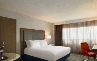 spacious king room with work desk and coffee station at DoubleTree by Hilton Hotel Albuquerque.