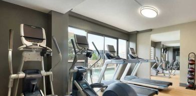 fitness center well equipped for all exercise types at DoubleTree by Hilton Hotel Albuquerque.