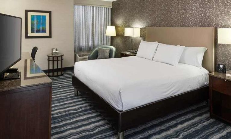 comfortable king room with TV and work desk ideal for working remotely at DoubleTree by Hilton Hotel Wilmington.