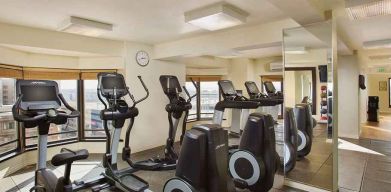 well equipped fitness center at Hilton Rosemont/Chicago O'Hare.