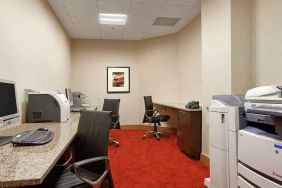 dedicated business center with work desk, PC, internet, and printers at Hilton Rosemont/Chicago O'Hare.