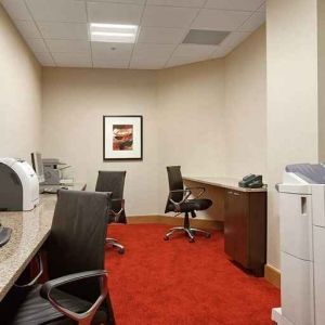 dedicated business center with work desk, PC, internet, and printers at Hilton Rosemont/Chicago O'Hare.