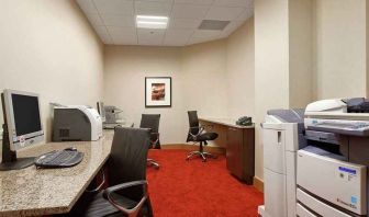 dedicated business center with work desk, PC, internet, and printers at Hilton Rosemont/Chicago O'Hare.