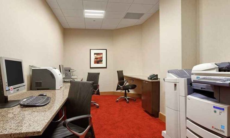 dedicated business center with work desk, PC, internet, and printers at Hilton Rosemont/Chicago O'Hare.