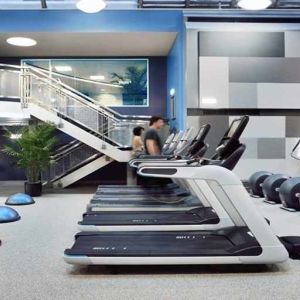 well equipped fitness center with treadmills and weights at Palmer House a Hilton Hotel.