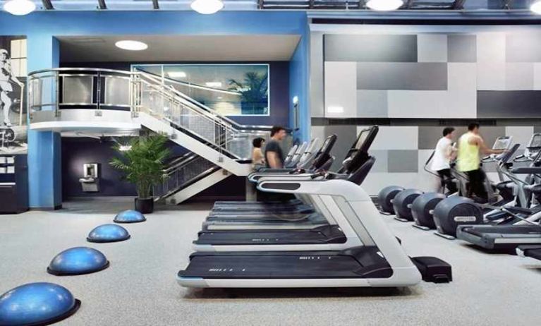 well equipped fitness center with treadmills and weights at Palmer House a Hilton Hotel.