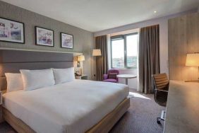 King guestroom with working station at the Hilton Garden Inn Dublin Custom House.