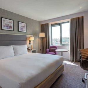 King guestroom with working station at the Hilton Garden Inn Dublin Custom House.