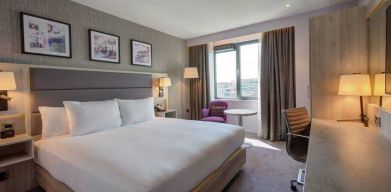 King guestroom with working station at the Hilton Garden Inn Dublin Custom House.