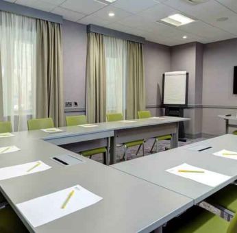 Small meeting room with u shape table at the Hilton Garden Inn Dublin Custom House.