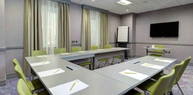 Small meeting room with u shape table at the Hilton Garden Inn Dublin Custom House.