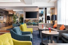 Comfortable lobby workspace with sofas at the Hilton Garden Inn Dublin Custom House.