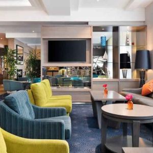 Comfortable lobby workspace with sofas at the Hilton Garden Inn Dublin Custom House.