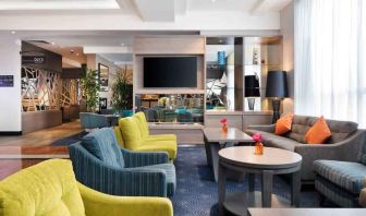 Comfortable lobby workspace with sofas at the Hilton Garden Inn Dublin Custom House.