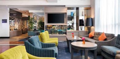 Comfortable lobby workspace with sofas at the Hilton Garden Inn Dublin Custom House.