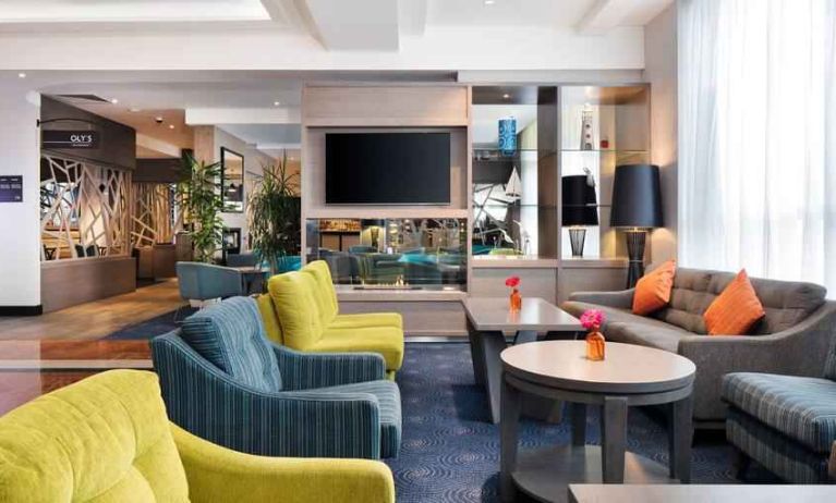 Comfortable lobby workspace with sofas at the Hilton Garden Inn Dublin Custom House.