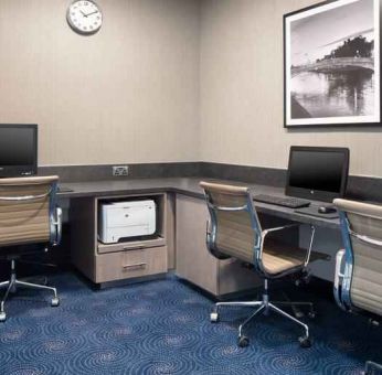 Working station with computers and printer at the Hilton Garden Inn Dublin Custom House.