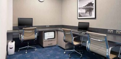 Working station with computers and printer at the Hilton Garden Inn Dublin Custom House.