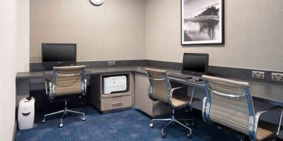 Working station with computers and printer at the Hilton Garden Inn Dublin Custom House.