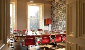 Elegant meeting room with square table at the Morrison, a DoubleTree by Hilton Hotel.