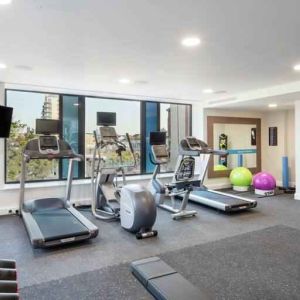 Fitness center with treadmills at the Hampton by Hilton Belfast City Centre.