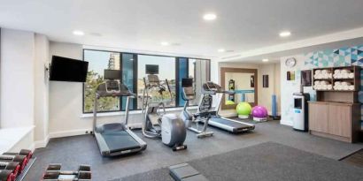 Fitness center with treadmills at the Hampton by Hilton Belfast City Centre.