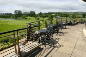 Outdoor terrace overlooking the golf field at the Hilton Belfast Templepatrick Golf & Country Club.