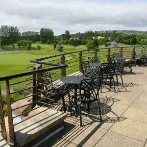 Outdoor terrace overlooking the golf field at the Hilton Belfast Templepatrick Golf & Country Club.