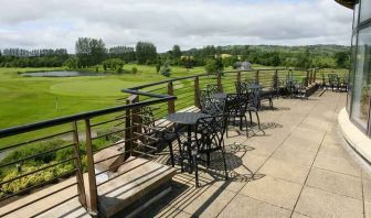 Outdoor terrace overlooking the golf field at the Hilton Belfast Templepatrick Golf & Country Club.