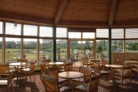 Restaurant area with view at the Hilton Belfast Templepatrick Golf & Country Club.