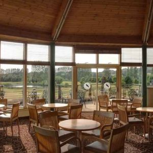 Restaurant area with view at the Hilton Belfast Templepatrick Golf & Country Club.