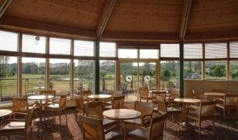 Restaurant area with view at the Hilton Belfast Templepatrick Golf & Country Club.