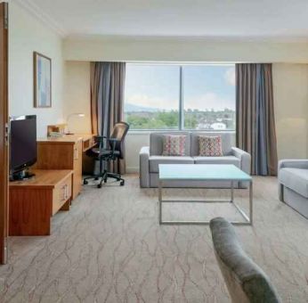 Comfortable living room in a hotel suite at the Hilton Dublin Airport.