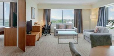 Comfortable living room in a hotel suite at the Hilton Dublin Airport.