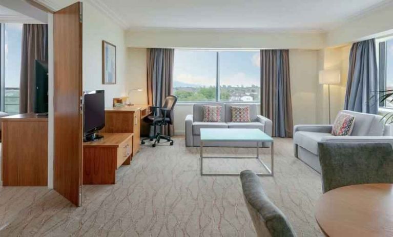 Comfortable living room in a hotel suite at the Hilton Dublin Airport.