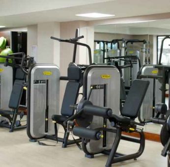 Fitness center with machines at the Hilton Dublin Airport.