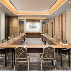 Elegant meeting room with u shape table at the Hilton Garden Inn Jakarta Taman Palem.