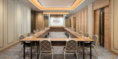 Elegant meeting room with u shape table at the Hilton Garden Inn Jakarta Taman Palem.