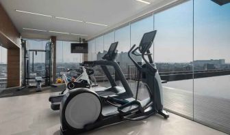 Fitness center with treadmills at the Hilton Garden Inn Jakarta Taman Palem.