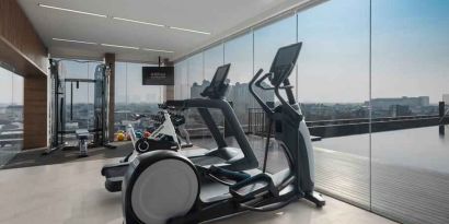 Fitness center with treadmills at the Hilton Garden Inn Jakarta Taman Palem.