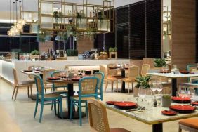 Dining area perfect for co-working at the Hilton Garden Inn Jakarta Taman Palem.