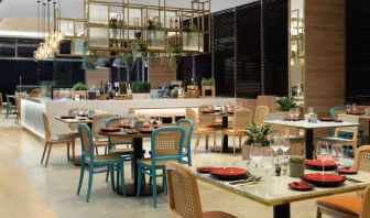 Dining area perfect for co-working at the Hilton Garden Inn Jakarta Taman Palem.