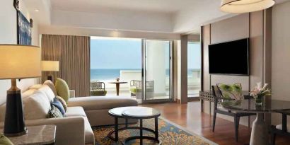 Comfortable living room with working station at the Hilton Bali Resort.