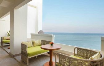 Hotel balcony overlooking the water at the Hilton Bali Resort.